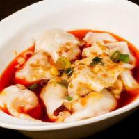 紅油抄手 Wontons In Chili Oil · Spice level 6/10. Eight steamed pork wontons in chili sauce with black vinegar, topped with ...