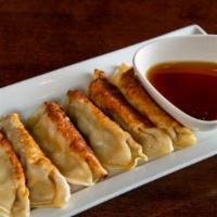 Chicken Fried Dumplings · Not Spicy. Six pan fried chicken dumplings w/ ginger soy sauce. Wheat, Gluten