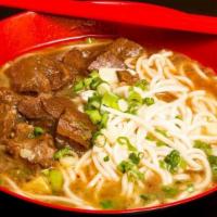 四川牛肉麵 Spicy Beef Noodle Soup · Spice level 5/10. Braised beef cubes with bok choy and bamboo shoots.