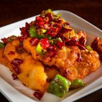 Dry Pepper Gf · Potato starch battered & cooked with chili oil, dry chili peppers & Sichuan peppercorn.