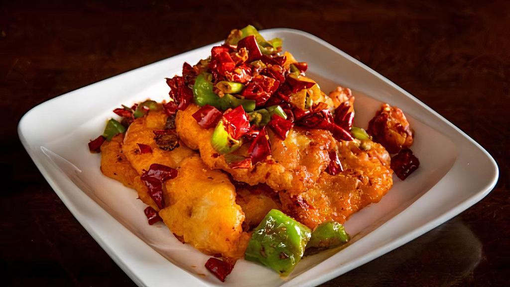 Dry Pepper Gf · Potato starch battered & cooked with chili oil, dry chili peppers & Sichuan peppercorn.