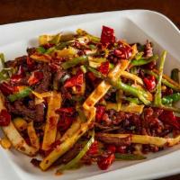 Dry Fry Gf · Shredded meat stir fried with long hot peppers and bamboo shoots. Spicy.