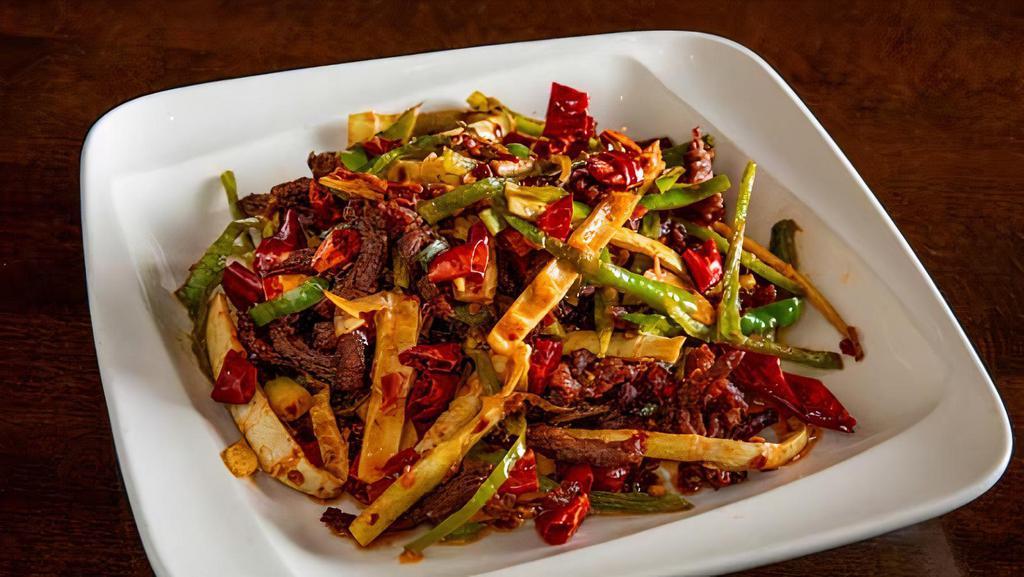 Dry Fry Gf · Shredded meat stir fried with long hot peppers and bamboo shoots. Spicy.