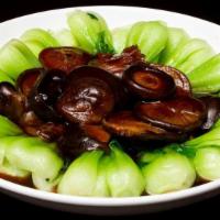 冬菇菜心 Bok Choy With Black Mushrooms · Not Spicy. Stir-fried in hoisin and oyster sauces. Served with rice.