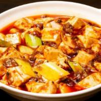 麻婆豆腐 Mapo Tofu With Minced Pork · Spice level 7/10. Soft tofu, minced pork and leeks in a chili oil based sauce. Served with r...