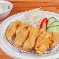 Chicken Katsu Bento · Chicken cutlet served with shredded cabbage, tomato, cucumber, , White rice and pickles