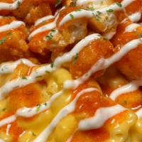 Buffalo Chicken Mac · Crispy Chicken, House Signature Buffalo Sauce, with a Ranch Drizzle.