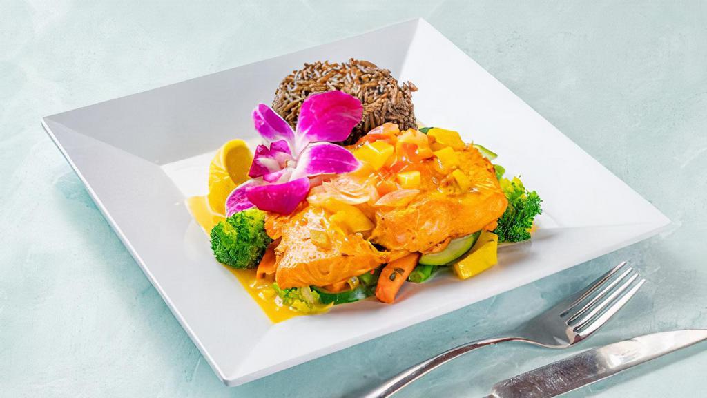 Sizzl'N Mango Salmon · Grilled salmon drizzled in Mango sauce served with market veggies & black rice