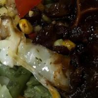Stew Oxtail Burrito · Comes with your choice of rice and vegetable.