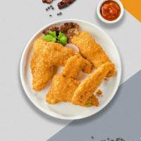 The Classical Chicken Tenders · Chicken tenders breaded and fried until golden brown. Served with your choice of dipping sau...