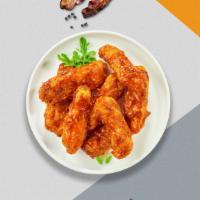 Hot In Nashville Tenders · Chicken tenders breaded and fried until golden brown before being tossed in Nashville hot sa...