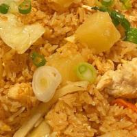 Pineapple Fried Rice · Fried rice with egg, pineapple, cabbage, carrot, onion and scallion.