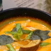 Red Curry · Coconut milk, bamboo shoot, bell pepper, eggplant, string bean and basil.
