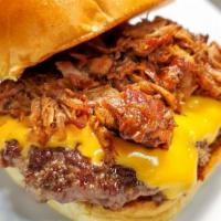 House Burger · Pulled Pork over Beef Patty.