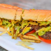 Cuban Steak Sandwich  (Pan Con Bistec) · Served with mayo, house mustard, lettuce, tomatoes, potato sticks and house aioli.