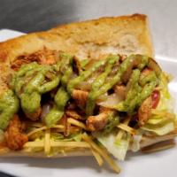 Grilled Chicken Sandwich · Served with mayo, house mustard, lettuce, tomatoes, grilled onions, potato sticks and house ...