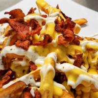 Loaded Fries · Cheese, Bacon and Ranch Sauce.
