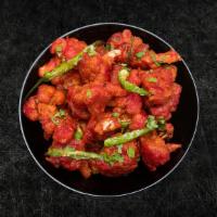 Cauliflower Southern Spice (Vegan) · House spiced fresh cauliflower sauteed with chilies, coriander, mustard seeds, and curry lea...