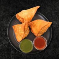 Samosa Delight (Vegan) (2 Pcs) · Flaky pastry dumplings filled with spiced potatoes, vegetables and deep-fried till crisp and...
