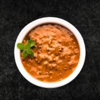 Daal Soulful Black (Vegan) · Black lentils slow cooked till smooth and creamy, tempered with Indian whole spices, and fin...