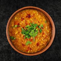Tomato Daal (Vegan) · Lentils and diced tomatoes slow cooked till smooth and creamy, tempered with Indian whole sp...