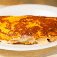 Cachapas · Sweet corn pancakes with mozzarella cheese.