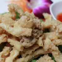 Thai Crispy Calamari · Deep fried breaded squid, served with sweet chili sauce.