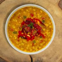 Dal Tadka Days  · Yellow lentils seasoned with garlic, cumin and cilantro.