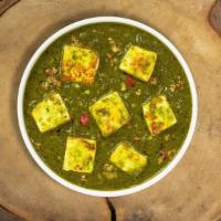 Pretty Palak Paneer · Cottage cheese cooked with blended Indian spices and spinach sauce.