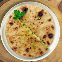 Aloo Paratha Pursuit  · Whole wheat Indian bread stuffed with mashed potatoes