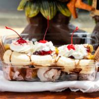 Banana Split · Strawberries, chocolate, vanilla, whipped cream, banana, chocolate syrup, pineapple, and a c...