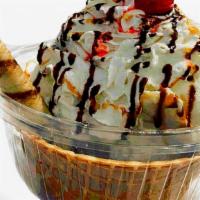 Ice Cream Sundae · One scoop ice cream, waffle cone, chocolate syrup, caramel syrup, whipped cream, a chocolate...