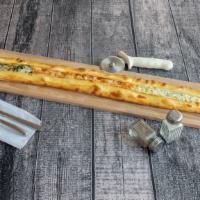 Veggie Paradise Pide · Potato, spinach, feta and mozzarella cheese
