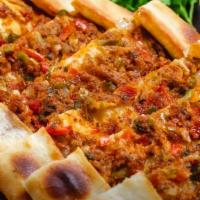 Turkish Sausage Pide · Turkish beef sausage, mozzarella cheese
