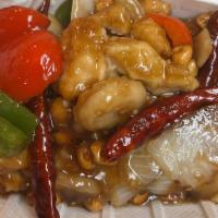 Kung Pao Chicken · Spicy. Stir-fried marinated chicken breast pieces with peanuts, chestnuts and red and green ...