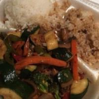 Veggie Stir Fry · Zucchini, mushrooms, carrots, onion, broccoli, served with soy sauce and rice.