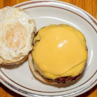 Texas Burger Deluxe  · Fried egg and American cheese, deluxe burgers are served with French fried potatoes, cooked ...