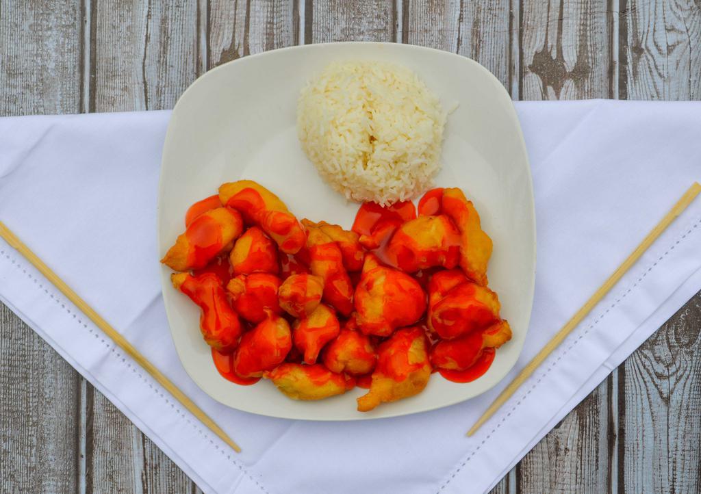 Sweet & Sour Chicken · Served with pork fried rice or lo mein and egg roll.