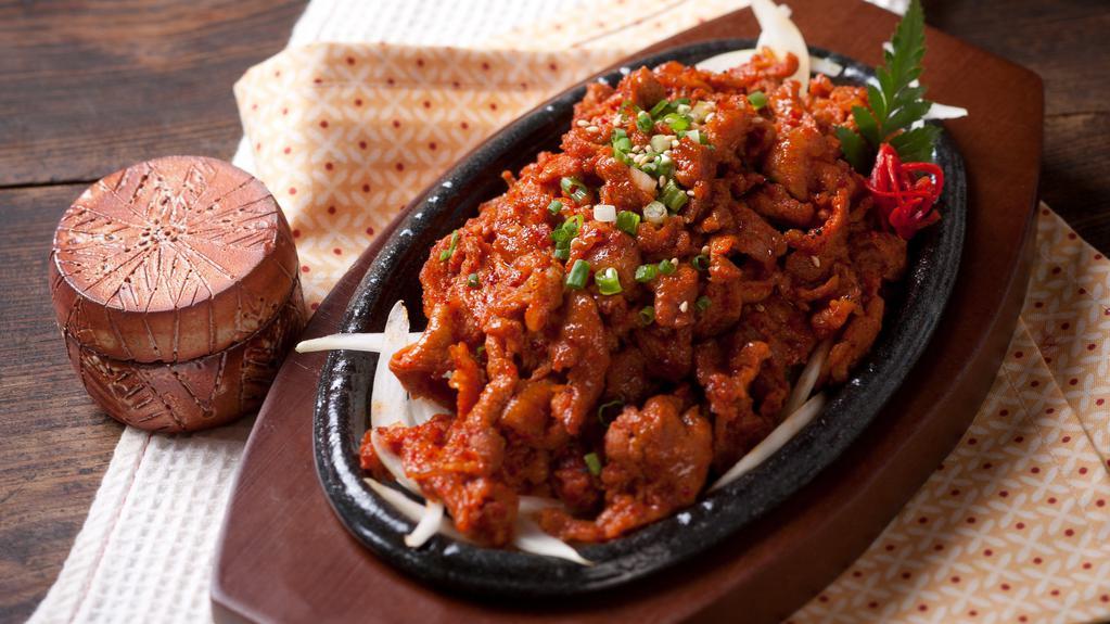 Spicy Pork Bulgogi · Marinated pork with red pepper paste.