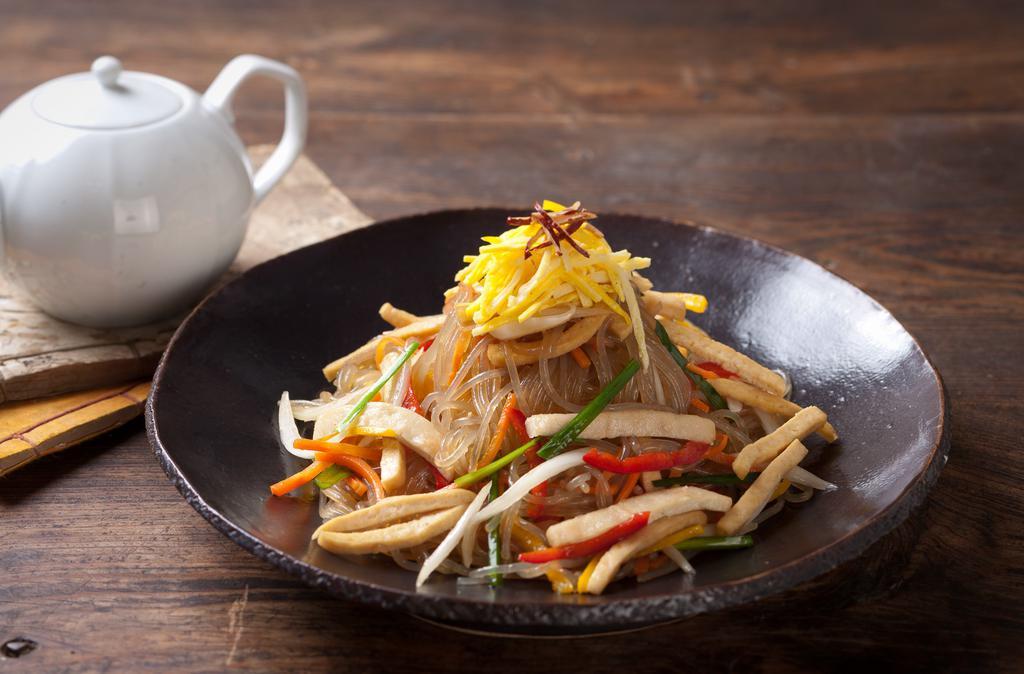 Jap Chae · Pan fried glass noodles with assorted vegetables and tofu cutlet. With or without beef. (잡채)
