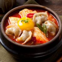 Dumpling Tofu Soup · Beef, pork and vegetable dumplings.