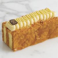 Millefeuille · Caramelized puffed pastry and light vanilla cream.