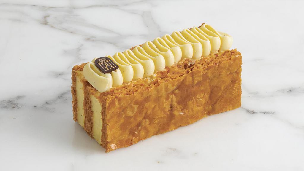 Millefeuille · Caramelized puffed pastry and light vanilla cream.