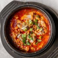 Soon Du Bu (Seafood / Kimchi / Pork) 순두부 · Mild spicy. Spicy silk tofu stew with egg and a choice of mixed seafood, kimchi or pork.