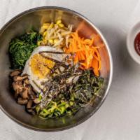 Bibimbap 비빔밥 · Assorted vegetables & egg over rice with red chili paste.