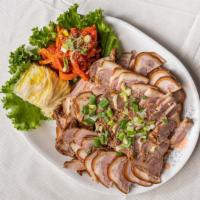 Jok Bal 족발 · Steamed marinated pork feet slices.