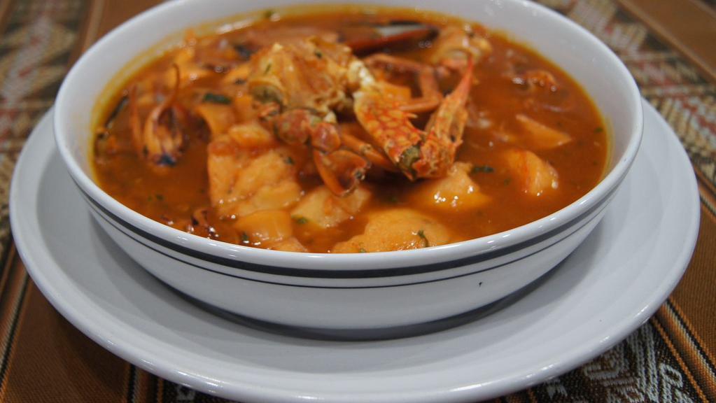 Parihuela · Mixed seafood soup with fish, calamari, shrimp, crab, mussel, and clams