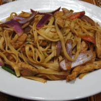 Tallarín Saltado De Pollo · Spaghetti and chicken sauteed with soy sauce, wine, green peppers, onions, and tomatoes