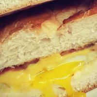 Pork Roll, Egg  &  Cheese · 4 Slices of Thick cut Pork Roll, 2 Eggs and Cheese.