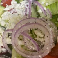 Greek Salad · Romaine, Red Onion, Black Olives, Roasted Red Peppers, Tomatoes, Cucumber & Feta Cheese